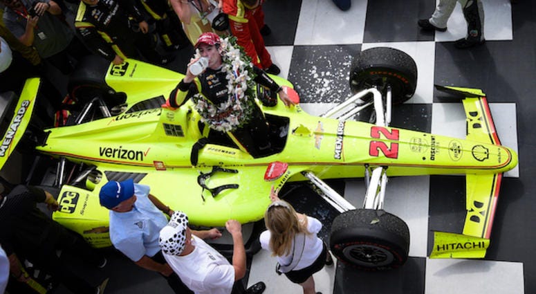 Team Penske's Simon Pagenaud Drinks The Milk In Victory Lane After Winning The 103rd Indianapolis 500 Team Penske's Simon Pagenaud Drinks The Milk In Victory Lane After Winning The 103rd Indianapolis 500