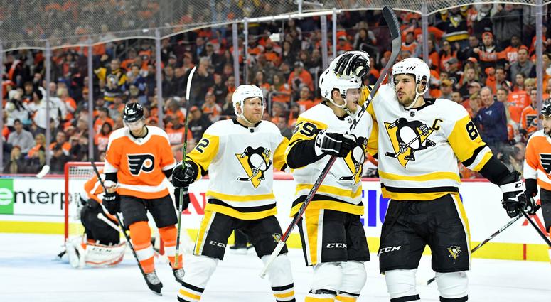 Pittsburgh Penguins Crosby celebrates a goal with Guentzel and Hornqvist Sidney Crosby