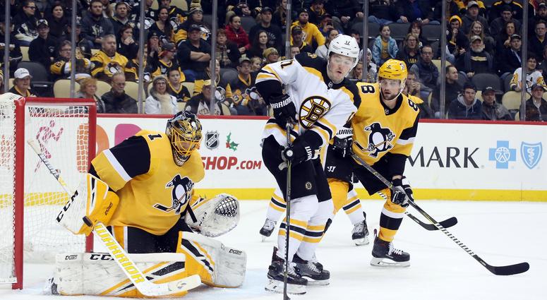 Pittsburgh Penguins goaltender Casey DeSmith (1) makes a save against Boston Bruins center Ryan Donato Pittsburgh Penguins goaltender Casey DeSmith (1) makes a save against Boston Bruins center Ryan Donato