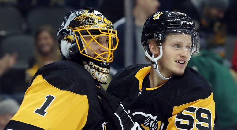 Penguins Goalie Casey DeSmith with Jake Guentzel