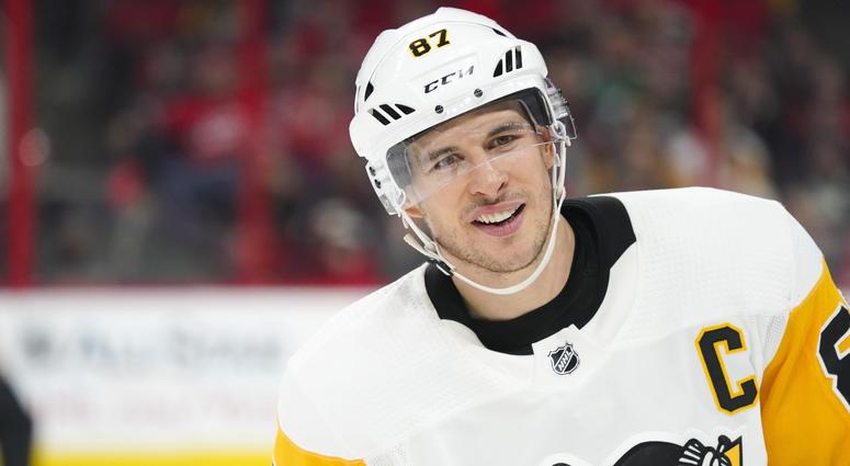 Pittsburgh Penguins center Sidney Crosby (87) smiles against the Carolina Hurricanes at PNC Arena. Pittsburgh Penguins center Sidney Crosby (87) smiles against the Carolina Hurricanes at PNC Arena.