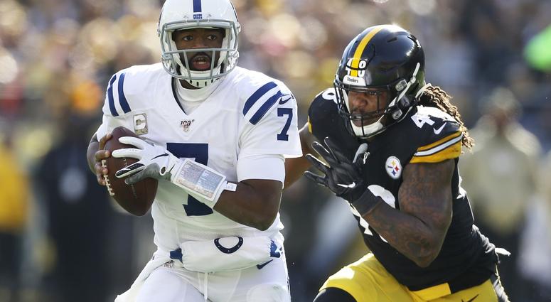 Pittsburgh, PA, USA; Indianapolis Colts quarterback Jacoby Brissett (7) runs with the ball as Pittsburgh Steelers outside linebacker Bud Dupree