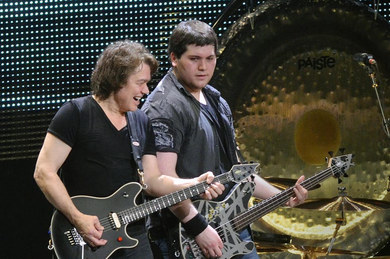 Guitarist Eddie Van Halen and his son/bassist Wolfgang Van Halen Guitarist Eddie Van Halen and his son/bassist Wolfgang Van Halen