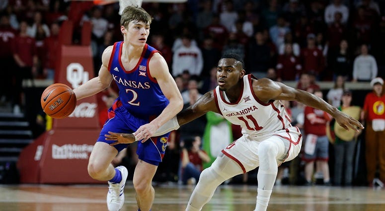 Moss scores 20 points, No. 6 Kansas beats Oklahoma 66-52
