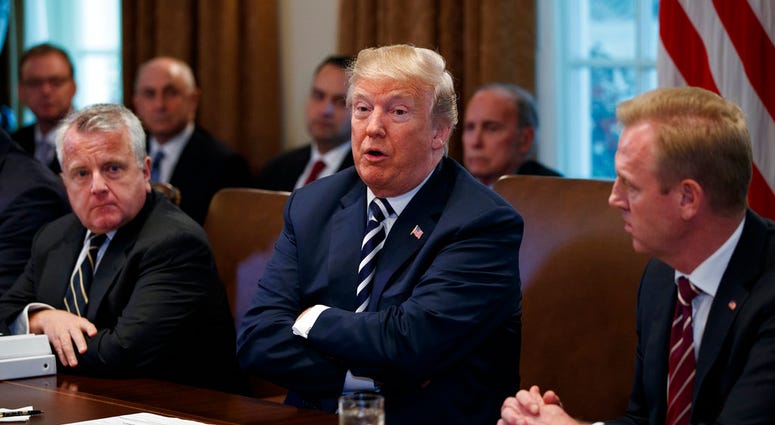 President Donald Trump speaks during a cabinet meeting at the White House, Wednesday, May 9, 2018, in Washington. From left, Deputy Secretary of State John Sullivan, Trump, and Deputy Secretary of Defense Patrick Shanahan. President Donald Trump speaks during a cabinet meeting at the White House, Wednesday, May 9, 2018, in Washington. From left, Deputy Secretary of State John Sullivan, Trump, and Deputy Secretary of Defense Patrick Shanahan.