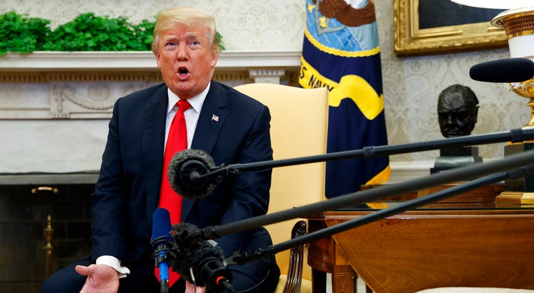 President Donald Trump speaks during a meeting with NATO Secretary General Jens Stoltenberg in the Oval Office of the White House, Thursday, May 17, 2018, in Washington.