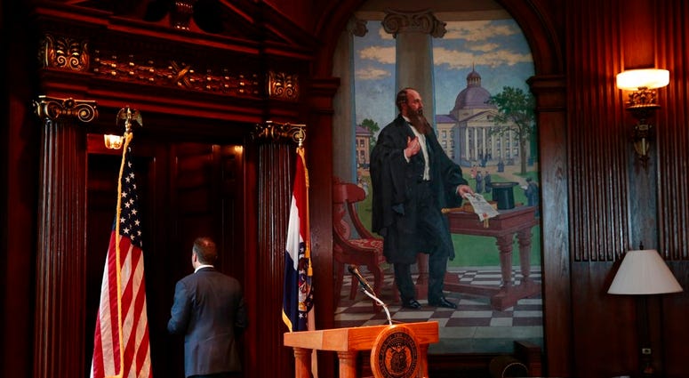 Missouri Gov. Eric Greitens leaves the podium after announcing his resignation in the governor's office, Tuesday, May 29, 2018, in Jefferson City, Mo.