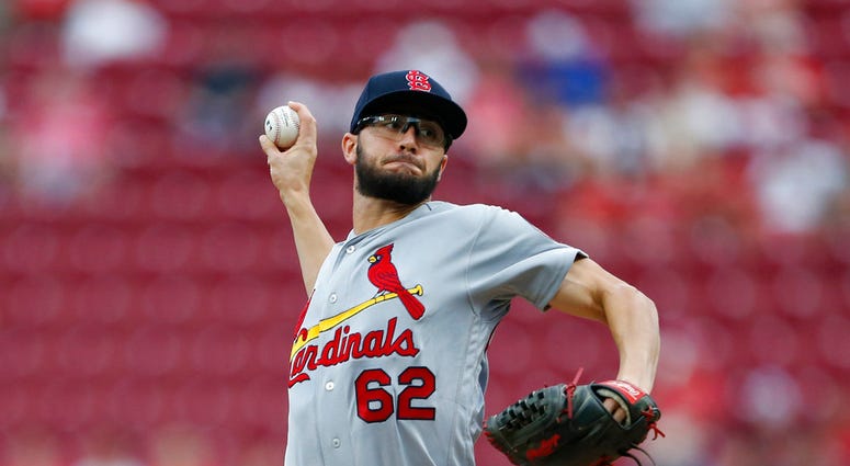St. Louis Cardinals starting pitcher Daniel Poncedeleon (62) throws against the Cincinnati Reds during the first inning of a baseball game, Monday, July 23, 2018, in Cincinnati.