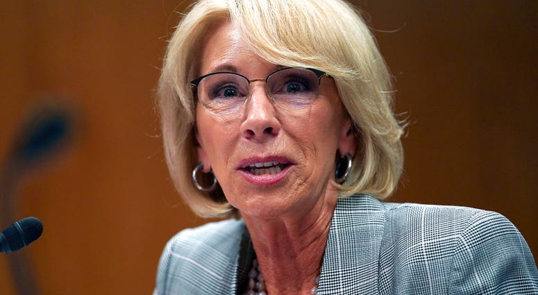 FILE - In this June 5, 2018, file photo, Education Secretary Betsy DeVos testifies during hearing on the FY19 budget on Capitol Hill in Washington.