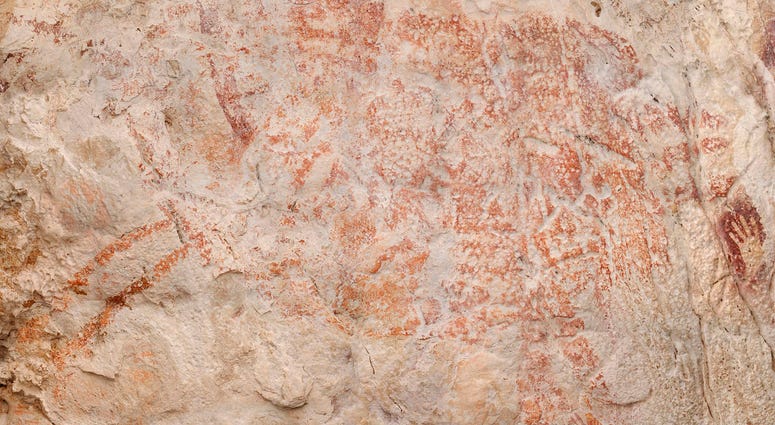 The world's oldest figurative artwork dated to a minimum of 40,000 years, in a limestone cave in the Indonesian The world's oldest figurative artwork dated to a minimum of 40,000 years, in a limestone cave in the Indonesian