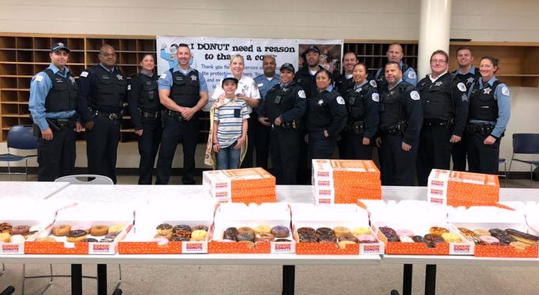 Boy has bought more than 60,000 doughnuts for cops. Boy has bought more than 60,000 doughnuts for cops.