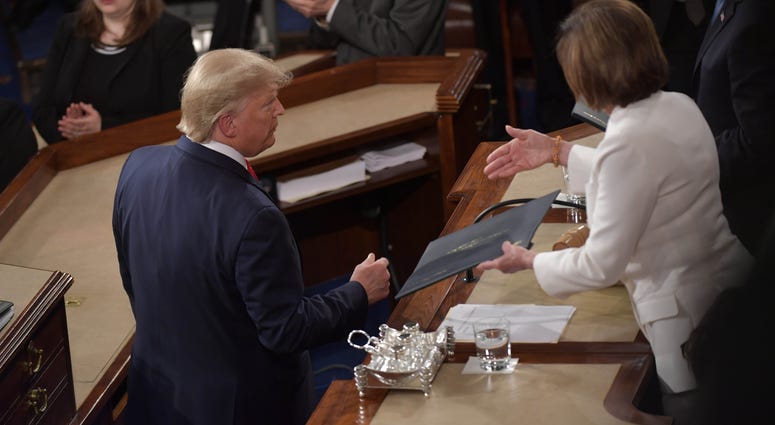 Nancy Pelosi offers her handshake to Donald Trump SOTU 2-4-20