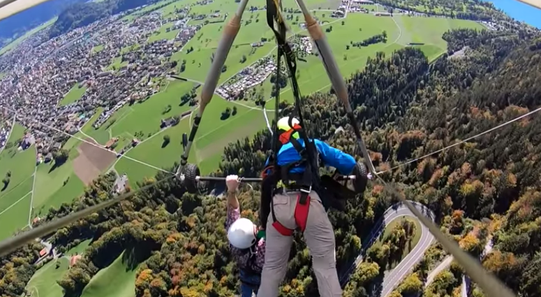 Hang glider nearly falls. Hang glider nearly falls.