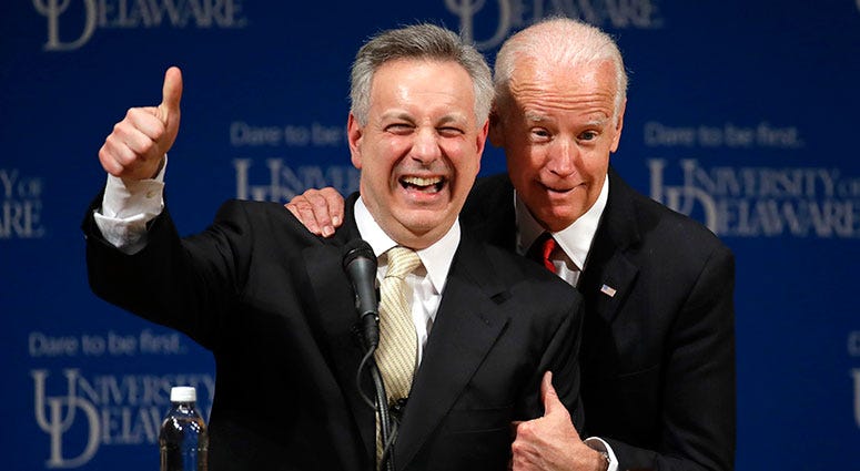 Joe Biden embraces University of Delaware President Dennis Assanis