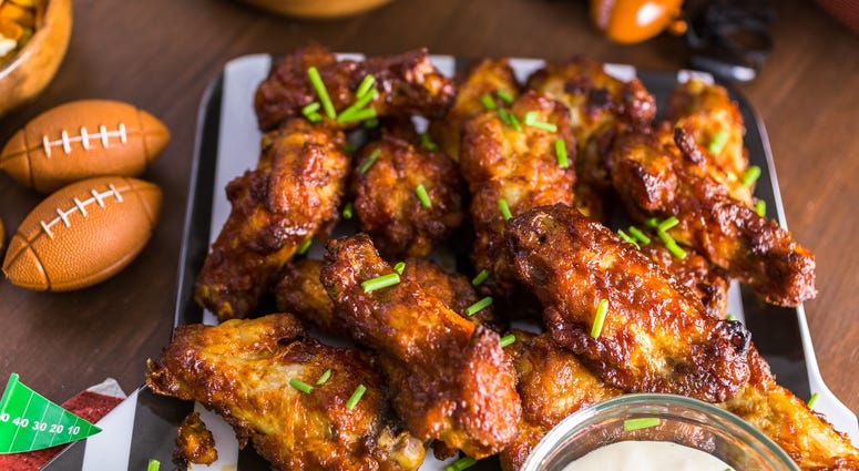 Chicken wings plate at a Super Bowl party. Chicken wings plate at a Super Bowl party.
