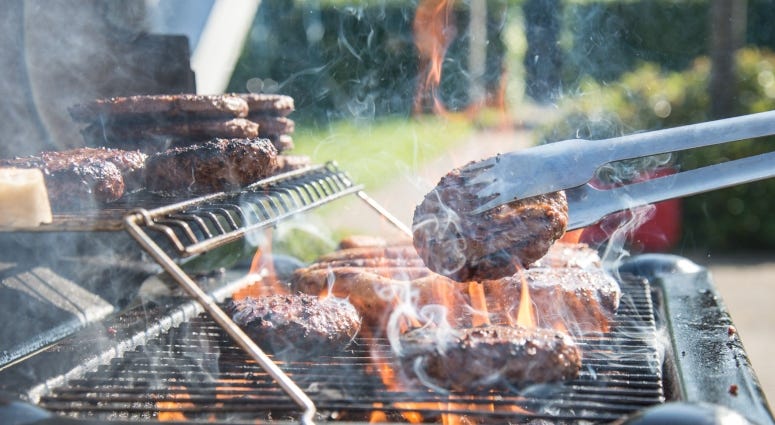 barbecue grill with burgers