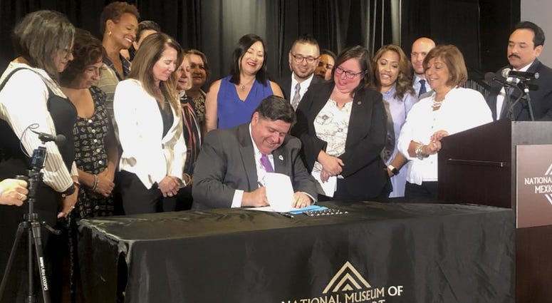 JB Pritzker signing bills into laws