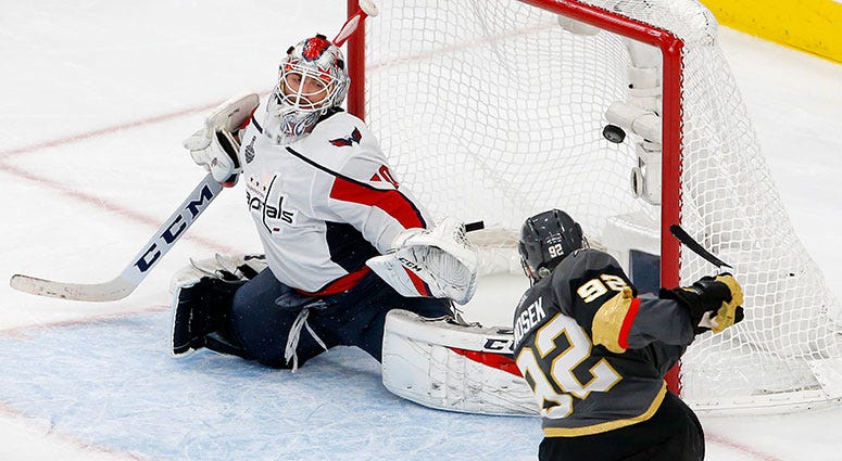 Washington Capitals goaltender Braden Holtby, left, is scored on by Vegas Golden Knights left wing Tomas Nosek, of the Czech Republic, during the third period in Game 1 of the NHL hockey Stanley Cup Finals Monday, May 28, 2018, in Las Vegas. (AP Photo/Ros Washington Capitals goaltender Braden Holtby, left, is scored on by Vegas Golden Knights left wing Tomas Nosek, of the Czech Republic, during the third period in Game 1 of the NHL hockey Stanley Cup Finals Monday, May 28, 2018, in Las Vegas. (AP Photo/Ros