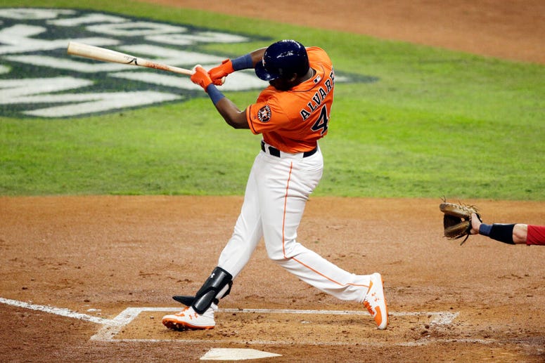 Yordan Alvarez #44 of the Houston Astros hits a single against the Washington Nationals during the second inning in Game Seven of the 2019 World Series at Minute Maid Park on October 30, 2019 in Houston, Texas.