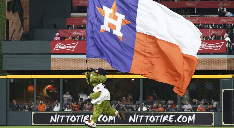 Orbit runs the Astros flag Orbit runs the Astros flag
