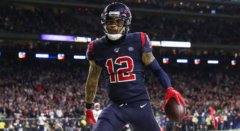Troy Taormina-USA TODAY Sports Houston Texans wide receiver Kenny Stills (12) scores a touchdown during the third quarter against the New England Patriots at NRG Stadium.