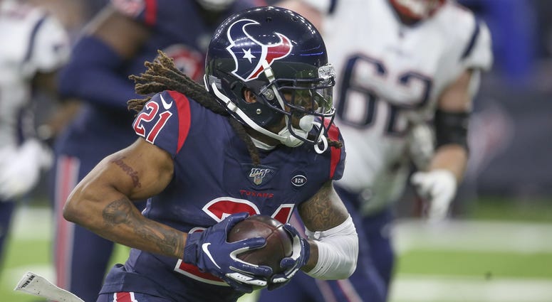 Bradley Roby returns an interception in the first quarter against the Patriots