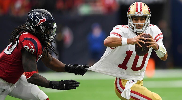 Dec 10, 2017; Houston, TX, USA; Houston Texans outside linebacker Jadeveon Clowney (90) pulls the jersey of San Francisco 49ers quarterback Jimmy Garoppolo (10) during the fourth quarter at NRG Stadium. Mandatory Credit: Shanna Lockwood-USA TODAY Sports Dec 10, 2017; Houston, TX, USA; Houston Texans outside linebacker Jadeveon Clowney (90) pulls the jersey of San Francisco 49ers quarterback Jimmy Garoppolo (10) during the fourth quarter at NRG Stadium. Mandatory Credit: Shanna Lockwood-USA TODAY Sports