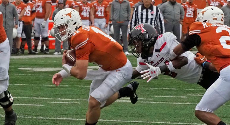 AP Photo/Michael Thomas Texas quarterback Sam Ehlinger (11) runs for a touchdown during the first half of an NCAA college football game against Texas Tech, Friday, Nov. 29, 2019, in Austin.