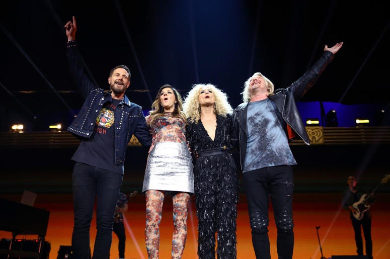 Jimi Westbrook, Karen Fairchild, Kimberly Schlapman, and Phillip Sweet of Little Big Town perform onstage Jimi Westbrook, Karen Fairchild, Kimberly Schlapman, and Phillip Sweet of Little Big Town perform onstage