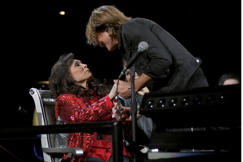 Keith Urban greets Loretta Lynn during Loretta Lynn: An All-Star Birthday Celebration Concert at Bridgestone Arena on April 1, 2019 in Nashville, Tennessee. Keith Urban greets Loretta Lynn during Loretta Lynn: An All-Star Birthday Celebration Concert at Bridgestone Arena on April 1, 2019 in Nashville, Tennessee