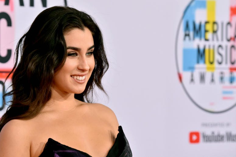 Lauren Jauregui Lauren Jauregui attends the 2018 American Music Awards at Microsoft Theater on October 9, 2018 in Los Angeles, California.