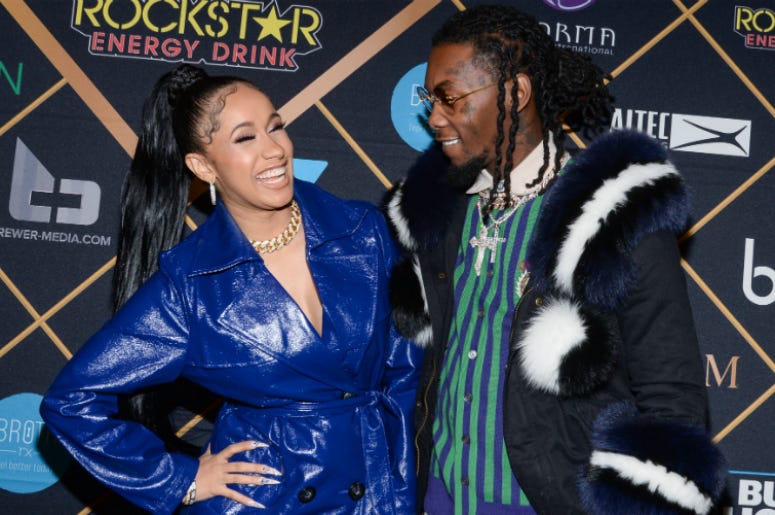 Cardi B & Offset Cardi B and Offset of Migos walking on the red carpet at the The 2018 MAXIM Party held at Schaffer-Richardson Building on February 3, 2018 in Minneapolis, Minnesota.