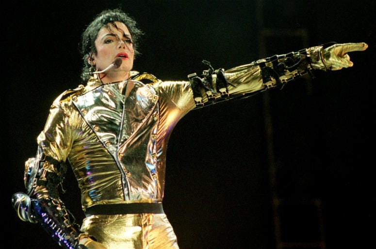 Michael Jackson AUCKLAND, NEW ZEALAND - NOVEMBER 10: Michael Jackson performs on stage during is 'HIStory' world tour concert at Ericsson Stadium November 10, 1996 in Auckland, New Zealand.