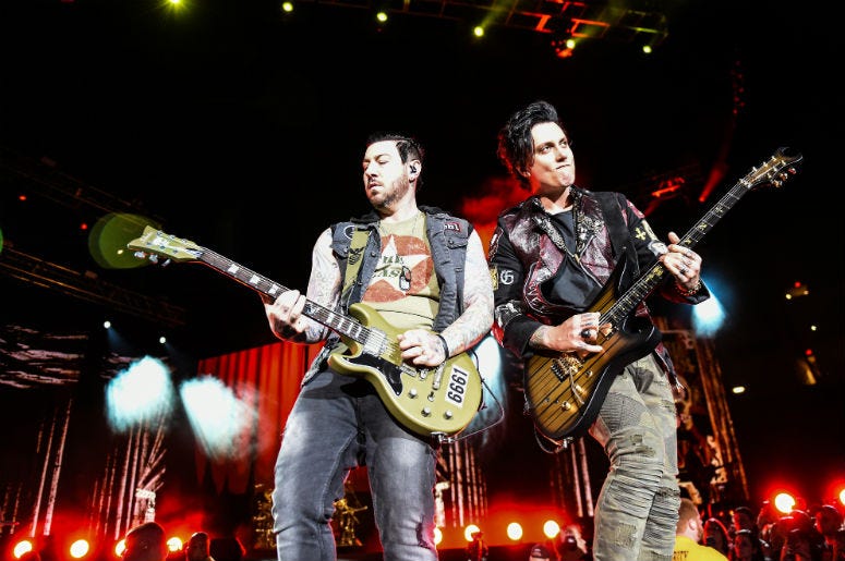 Zacky Vengeance and Synyster Gates of Avenged Sevenfold performs during Avenged Sevenfold's The Stage World Tour featuring Avenged Sevenfold, Volbeat and Motionless in White at Giant Center Zacky Vengeance and Synyster Gates of Avenged Sevenfold performs during Avenged Sevenfold's The Stage World Tour featuring Avenged Sevenfold, Volbeat and Motionless in White at Giant Center