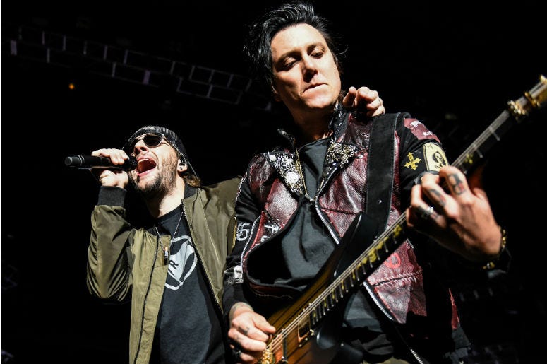 M. Shadows and Synyster Gates of Avenged Sevenfold perform during Avenged Sevenfold's The Stage World Tour featuring Avenged Sevenfold, Volbeat and Motionless in White at Giant Center M. Shadows and Synyster Gates of Avenged Sevenfold perform during Avenged Sevenfold's The Stage World Tour featuring Avenged Sevenfold, Volbeat and Motionless in White at Giant Center
