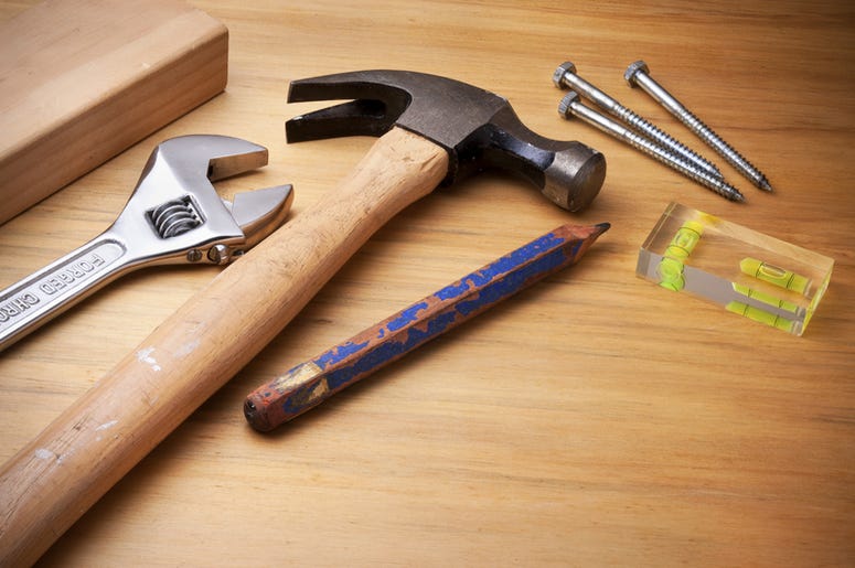 Tools on a wooden table Tools on a wooden table