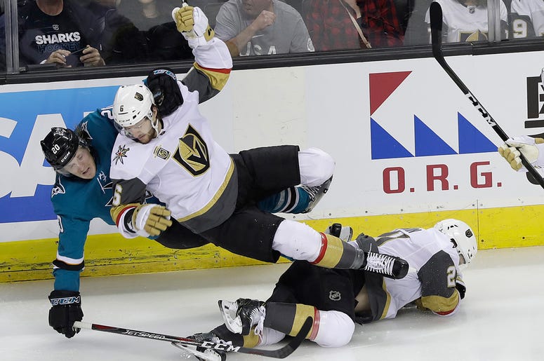San Jose Sharks left wing Marcus Sorensen, from Sweden, left, and Vegas Golden Knights defenseman Colin Miller fall over Cody Eakin during the first period of Game 3 of an NHL hockey second-round playoff series in San Jose, Calif., Monday, April 30, 2018. San Jose Sharks left wing Marcus Sorensen, from Sweden, left, and Vegas Golden Knights defenseman Colin Miller fall over Cody Eakin during the first period of Game 3 of an NHL hockey second-round playoff series in San Jose, Calif., Monday, April 30, 2018.