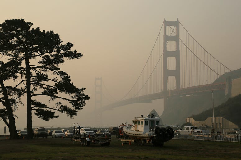 AP18320654885666 The Golden Gate Bridge is obscured by smoke and haze from wildfires Friday, Nov. 16, 2018, in this view from Fort Baker near Sausalito, Calif. (AP Photo/Eric Risberg)