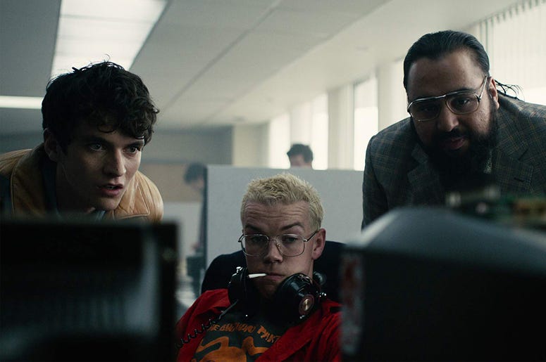 Fionn Whitehead, Will Poulter and Asim Chaudhry in 'Black Mirror: Bandersnatch' Fionn Whitehead, Will Poulter and Asim Chaudhry in 'Black Mirror: Bandersnatch' (Photo credit: Netflix)
