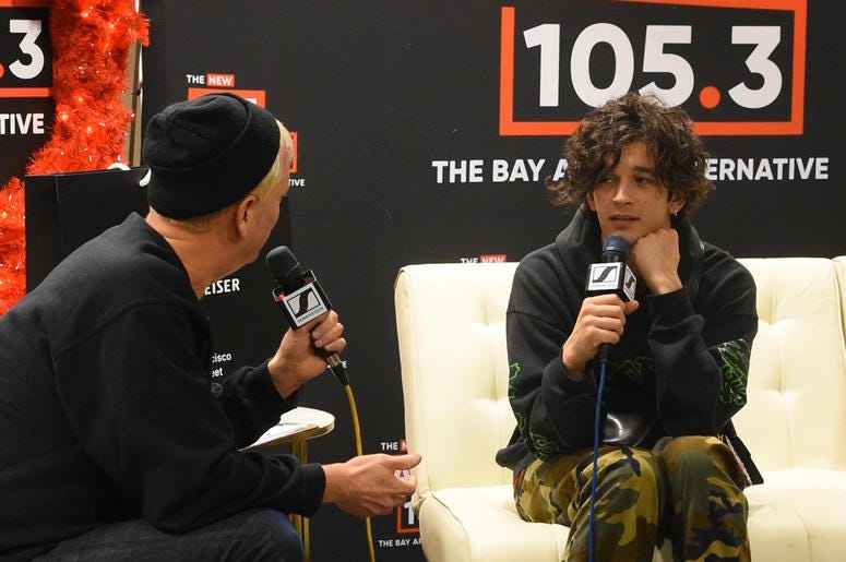 Matty Healy of The 1975 with Aaron Axelsen Matty Healy of The 1975 with Aaron Axelsen