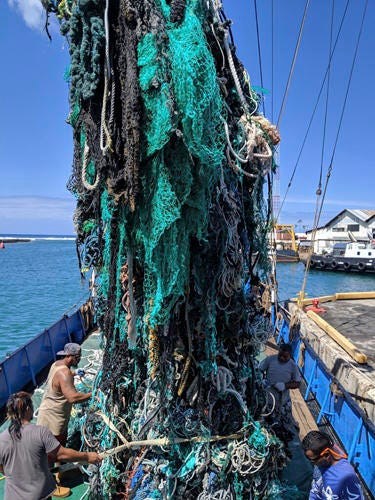 AP19178701820416 This photo taken June 18, 2019, provided by the Ocean Voyages Institute, shows a large net that was removed from the ocean during the Pacific gyre cleanup in Honolulu. (Greg Yoder/Ocean Voyages Institute via AP)