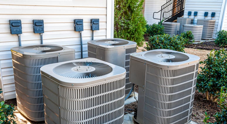air conditioning units outside of a town house