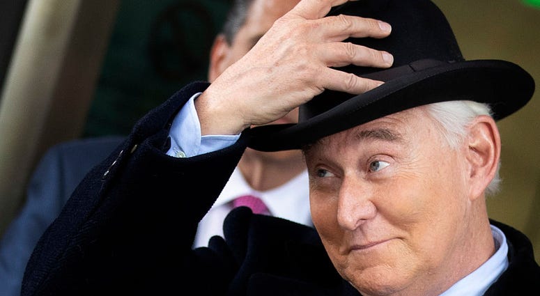 roger stone wearing a fedora