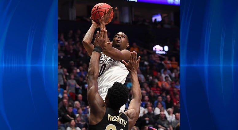 Texas A&M Aggies guard Jay Jay Chandler (0) shoots the ball over Vanderbilt Commodores forward Aaron Nesmith (24) during the first half of the SEC conference tournament at Bridgestone Arena. Texas A&M Aggies guard Jay Jay Chandler (0) shoots the ball over Vanderbilt Commodores forward Aaron Nesmith (24) during the first half of the SEC conference tournament at Bridgestone Arena.