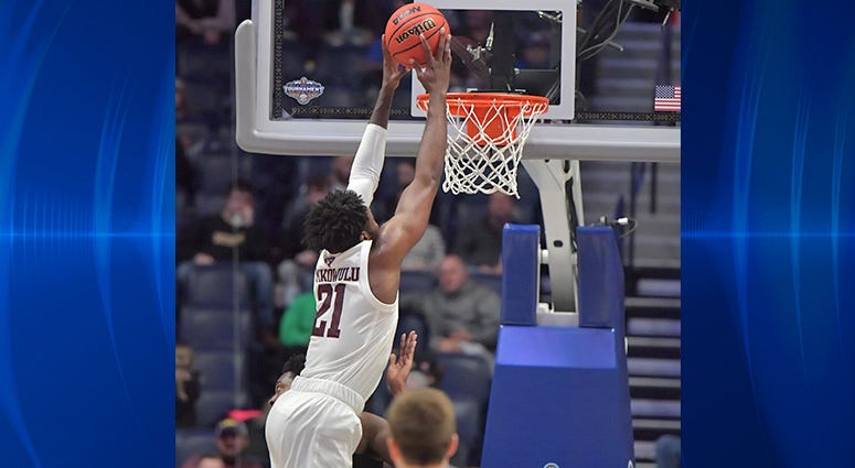 Texas A&M Aggies forward Christian Mekowulu (21) dunks the ball in the first half against the Vanderbilt Commodores in the SEC conference tournament at Bridgestone Arena. Texas A&M Aggies forward Christian Mekowulu (21) dunks the ball in the first half against the Vanderbilt Commodores in the SEC conference tournament at Bridgestone Arena.