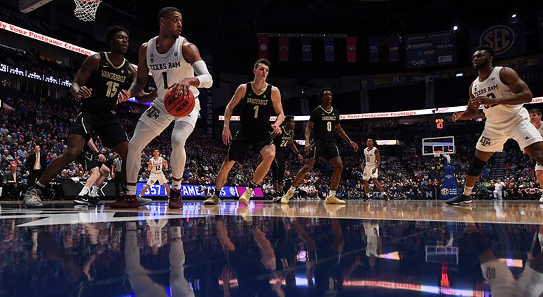 Texas A&M Aggies guard Savion Flagg (1) works along the baseline during the first half against the Vanderbilt Commodores of the SEC conference tournament at Bridgestone Arena. Texas A&M Aggies guard Savion Flagg (1) works along the baseline during the first half against the Vanderbilt Commodores of the SEC conference tournament at Bridgestone Arena.