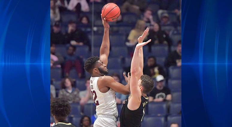 Texas A&M Aggies forward Josh Nebo (32) is defended by Vanderbilt Commodores forward Yanni Wetzell (1) in the first half in the SEC conference tournament at Bridgestone Arena. Texas A&M Aggies forward Josh Nebo (32) is defended by Vanderbilt Commodores forward Yanni Wetzell (1) in the first half in the SEC conference tournament at Bridgestone Arena.