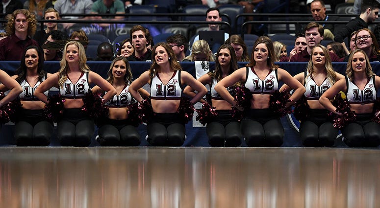 Texas A&M Aggies dancers during the first half against the Vanderbilt Commodores of the SEC conference tournament at Bridgestone Arena. Texas A&M Aggies dancers during the first half against the Vanderbilt Commodores of the SEC conference tournament at Bridgestone Arena.