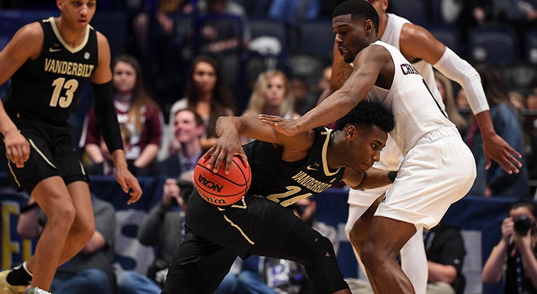 Vanderbilt Commodores forward Aaron Nesmith (24) is guarded by Texas A&M Aggies guard Jay Jay Chandler (0) during the first half of the SEC conference tournament at Bridgestone Arena. Vanderbilt Commodores forward Aaron Nesmith (24) is guarded by Texas A&M Aggies guard Jay Jay Chandler (0) during the first half of the SEC conference tournament at Bridgestone Arena.