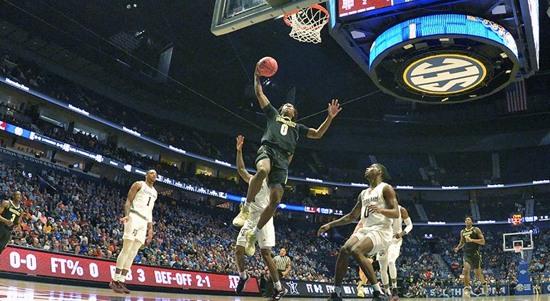 Vanderbilt Commodores guard Saben Lee (0) shoots the ball against the Texas A&M Aggies during the first half of game two in the SEC conference tournament at Bridgestone Arena. Vanderbilt Commodores guard Saben Lee (0) shoots the ball against the Texas A&M Aggies during the first half of game two in the SEC conference tournament at Bridgestone Arena.